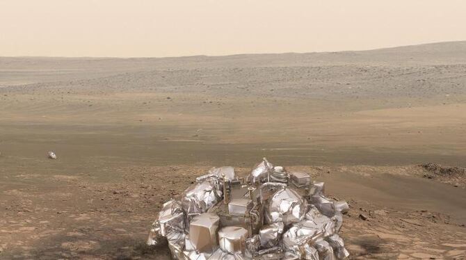 Das »Schiaparelli«-Moduls nach der Landung auf der Oberfläche des Mars. Im Hintergrund ist der Fallschirm zu sehen, der die G