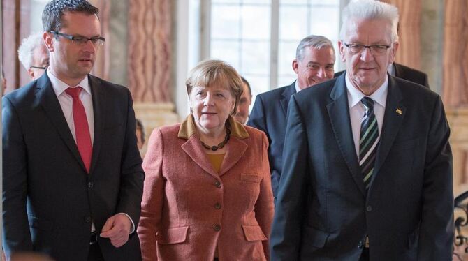 Der Rottenburger Oberbürgermeister Stephan Neher (CDU), Bundeskanzlerin Angela Merkel (CDU) und Baden-Württembergs Ministerpräsi