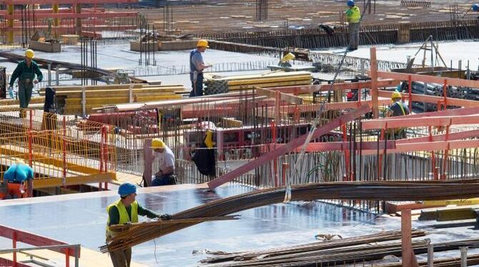 Bauarbeiter auf einer Baustelle in München. Deutschland kann 2017 laut aktueller Prognose mit einer Steigerung ihrer Wirtscha