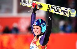 Die Baden-Württembergerin Carina Vogt gewinnt als erste Frau olympisches Gold beim Skispringen. FOTO: DPA