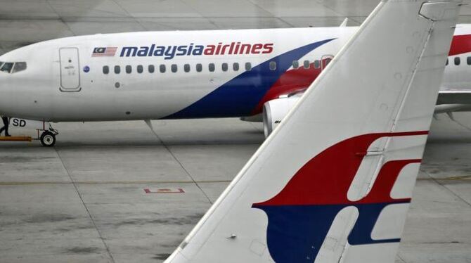 Malaysia-Airline-Flugzeuge auf dem Flughafen von Kuala Lumpur. Gehört das am Strand von La Reunion gefundene Wrackteil zur ve