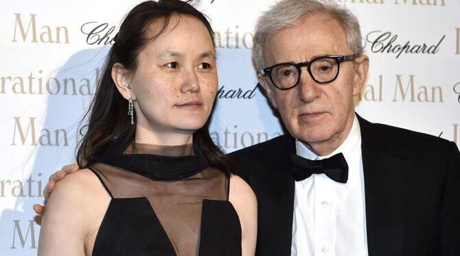 Woody Allen mit Ehefrau Soon Yi 2014 in Cannes. Foto: Franck Robichon