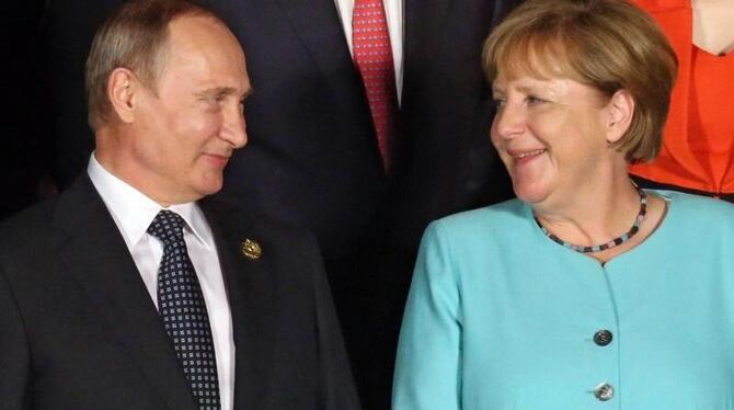 Beraten in Berlin über die Ukraine-Krise: Russlands Präsident Putin und Bundeskanzlerin Merkel. Foto: Alexei Druzhinin/Sputni