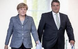 Wie reagiert die SPD um Parteichef Sigmar Gabriel auf die Ankündigung von Kanzlerin Angela Merkel? Foto: Michael Kappeler