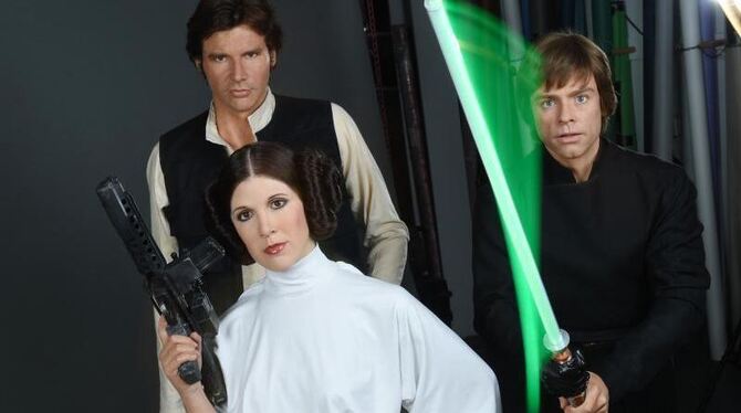 Die Wachsfiguren der »Star Wars«-Helden »Han Solo« (l-r), »Prinzessin Leia« und »Luke Skywalker« in London. Foto: Jens Kalaen