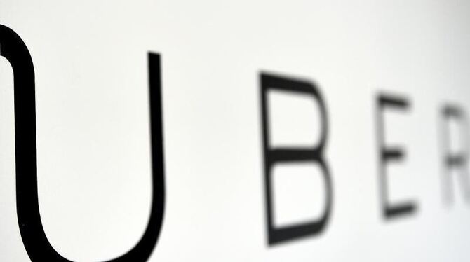 Das Logo des Unternehmens Uber. Foto: Britta Pedersen/Illustration