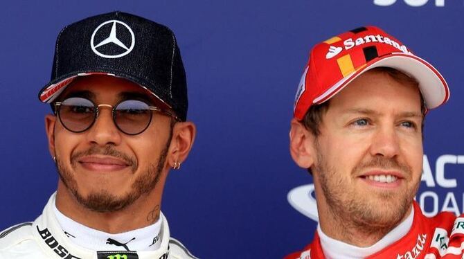 Der Vorsprung von Sebastian Vettel (r) gegenüber Lewis Hamilton ist stark geschrumpft. Foto: Tim Goode