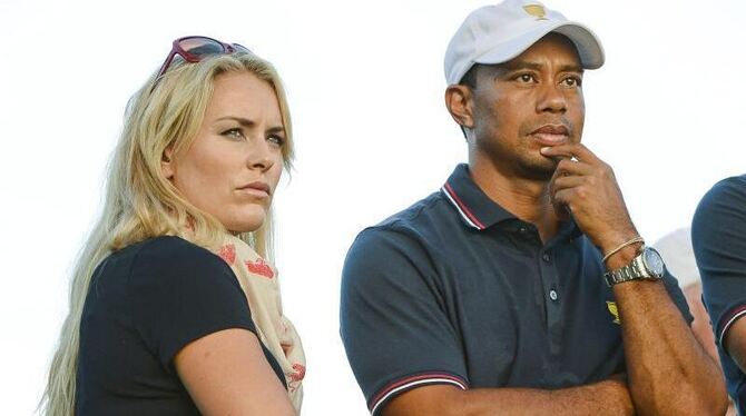 Tiger Woods (r) und Lindsey Vonn (2013). Foto: Tannen Maury