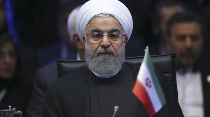 Sieht sich mit Protesten der Bevölkerung konfrontiert: Der iranische Präsident Hassan Ruhani. Foto: Erhan Elaldi