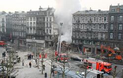 Vermutlich legte eine Gasexplosion das fünfstöckige Wohnhaus in Schutt und Asche.