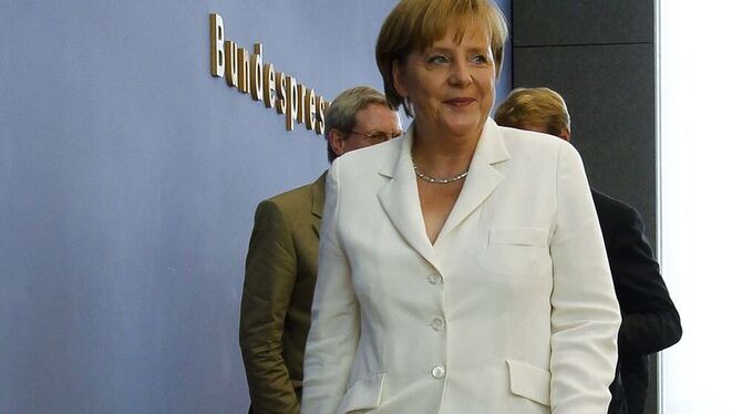 Lächelnd vor der letzten Bundespressekonferenz vor der Sommerpause: Angela Merkel. FOTO: AP