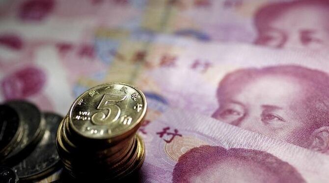 Chinesische Münzen und Banknoten: China bekommt die Inflation nicht in den Griff. Die Preissteigerungen erreichten im Juni mi