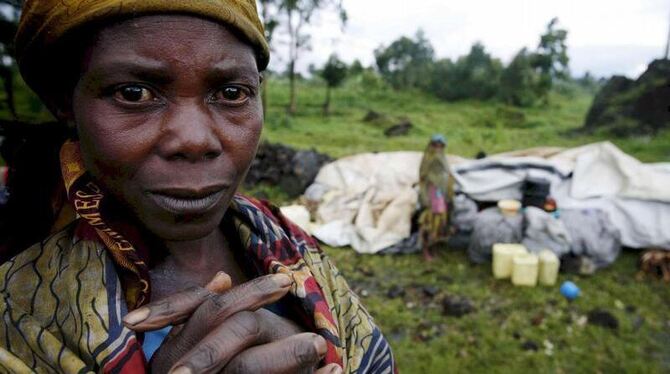 Kongolesische Frau in einem Flüchtlingslager: Viele Opfer und Zeugen wollen zu den grausamen Taten nicht Aussagen - aus Angst