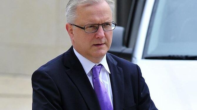 EU-Währungskommissar Olli Rehn will sich schnell mit Madrid über die Konditionen für die Finanzhilfen einigen. Foto: Nicolas