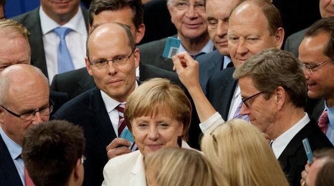 Sie hat die Zweidrittel-Mehrheit: Bundeskanzlerin Angela Merkel im Bundestag. Foto: Maurizio Gambarini