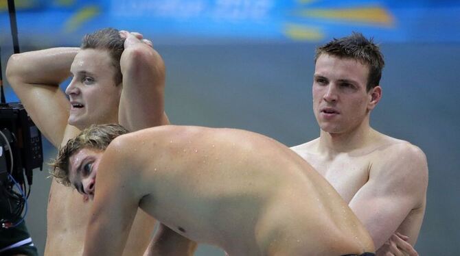 Enttäuscht: Tim Wallburger (links), Dimitri Colupaev (mitte) und Paul Biedermann (rechts). Foto:DPA