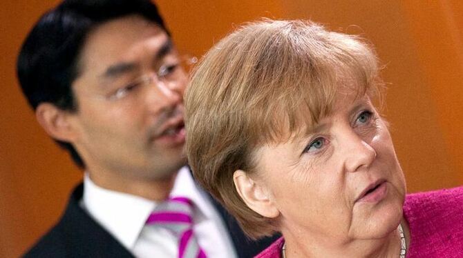 Philipp Rösler und Angela Merkel.
