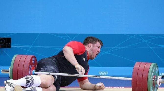 Von fast 200 Kilogramm auf die Mattegestreckt: der deutsche Olympiasieger von 2008, Matthias Steiner. Foto: Friso Gentsch Von fast 200 Kilogramm auf die Mattegestreckt: der deutsche Olympiasieger von 2008, Matthias Steiner. Foto: Friso Gentsch