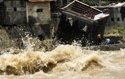 Die Zahl der Toten nach der Flutkatastrophe auf den Philippinen steigt. Foto: Francis R. Malasig