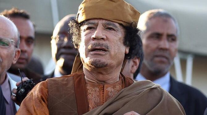 Der libysche Diktator Muammar al-Gaddafi soll im Wüstensand einen Goldschatz vergraben haben. Foto: Mohamed Messara/Archiv