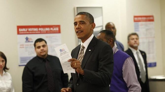 Barack Obama ist der erste Präsident in der US-Geschichte, der vor dem Wahltag an die Urne ging. Foto: Brian Cassella Barack Obama ist der erste Präsident in der US-Geschichte, der vor dem Wahltag an die Urne ging. Foto: Brian Cassella