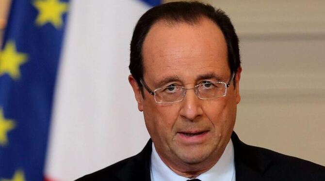 Frankreichs Präsident Hollande gibt bekannt, dass französische Truppen in Mali eingetroffen sind. Foto: Philippe Wojazer  