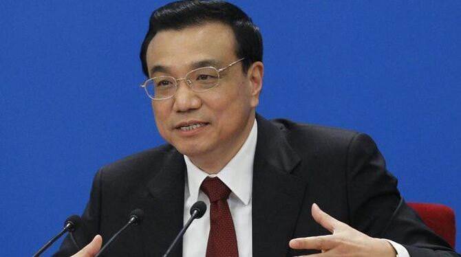 Chinas neuer Regierungschef Li Keqiang bei seinem ersten Auftritt vor der Presse. Foto: How Hwee Young Chinas neuer Regierungschef Li Keqiang bei seinem ersten Auftritt vor der Presse. Foto: How Hwee Young