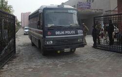 Ein Gefangenentransport der Polizei in Indiens Hauptstadt Neu Delhi. Foto: Anindito Mukherjee