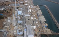 Die IAEA besichtigt auf Bitte der japanischen Regierung die Atomruine in Fukushima. Foto: Air Photo Service