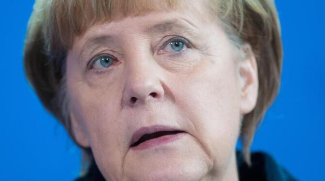 Angela Merkel ist über Gaucks Entscheidung, nicht zu den Olympischen Winterspielen zu fahren, verärgert. Foto: Maurizio Gamba