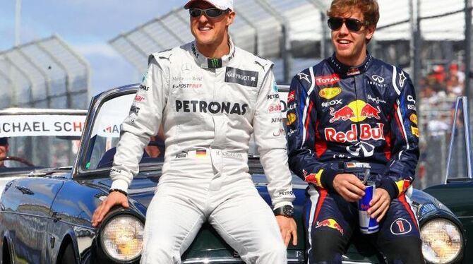 Michael Schumacher und Sebastian Vettel sind gute Freunde. Foto: Jens Büttner