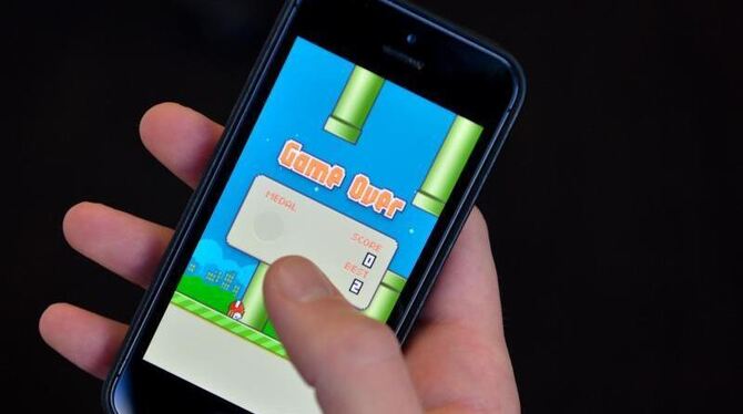 Der Entwickler des Spiels »Flappy Bird« macht einen Rückzieher, weil er vom Erfolg überwältigt worden sei. Foto: Marc Tirl