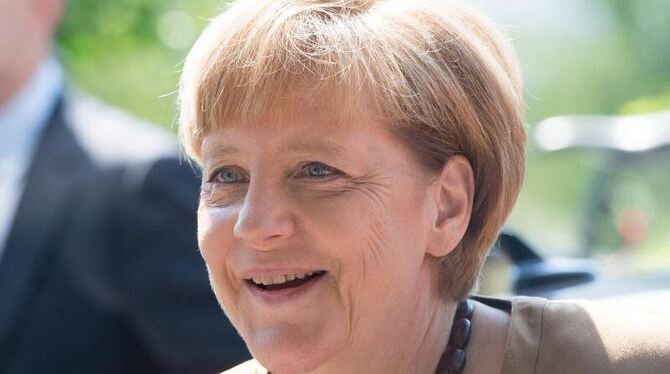 Angela Merkel will bis mindestens 2017 im Amt bleiben. Foto: Maurizio Gambarini/dpa
