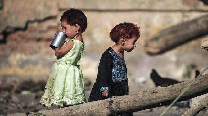 Kinder im Flüchtlingslager Darul-Aman in Kabul, Afghanistan. Foto: Hannibal/Archiv