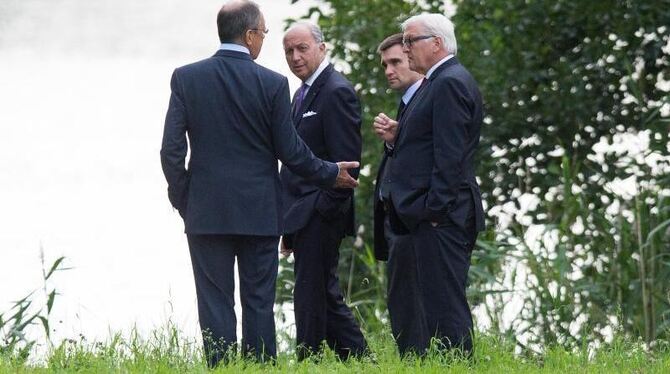 Die Außenminister Russlands, Frankreichs, der Ukraine und Deutschlands (l-r) in Berlin. Foto: Maurizio Gambarini