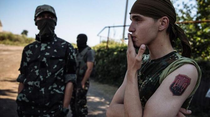 Ratlos und erschöpft: Ukrainische Soldaten bei Lugansk. Foto: Roman Pilipey