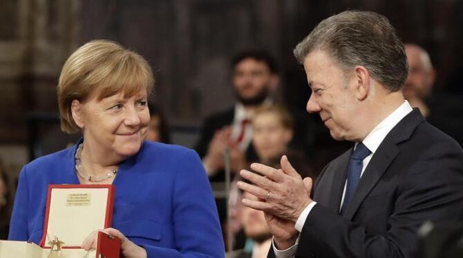Angela Merkel und Juan Manuel Santos