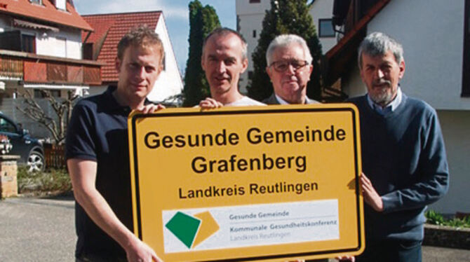 Die SPD-Kandidaten von Grafenberg sind stolz auf den Titel Gesunde Gemeinde.  FOTOS: PR