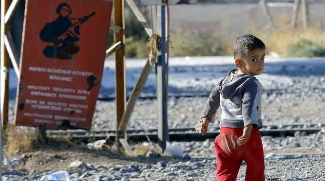 Ein Flüchtlingskind aus Syrien in einem Lager an der türkischen Grenze. Foto: Sedat Suna