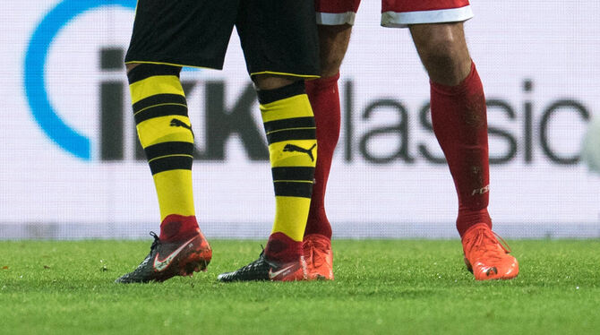 Könnten bald wieder beim BVB vereint sein: Mats Hummels (rechts) und Mario Götze. FOTOS: DPA