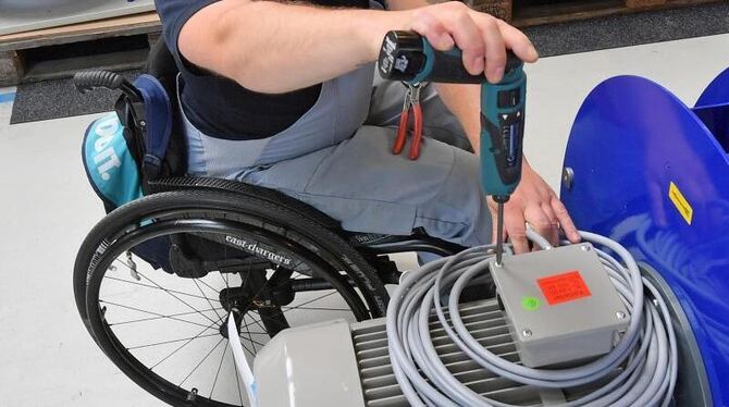 Im Rollstuhl am Arbeitsplatz