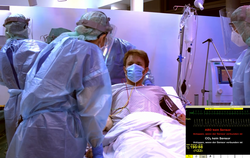 Szene aus dem Lehrfilm zur intensivmedizinischen Therapie bei Covid-19-Patientinnen und -Patienten.                             