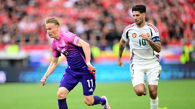 EM, EURO 2024, Europameisterschaft, Nationalmannschaft, Laenderspiel, DFB, Aktion, Zweikampf Nur eine Einwechslung bisher: Der Stuttgarter Chris Führich (links).