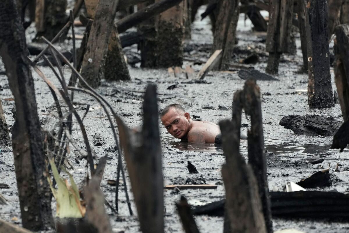 Nach dem Großbrand in einem  Armenviertel von Manila