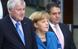 Die Parteivorsitzenden von CSU, CDU und SPD: Horst Seehofer (v.l.), Angela Merkel und Sigmar Gabriel. Foto: Hannibal Hanschke