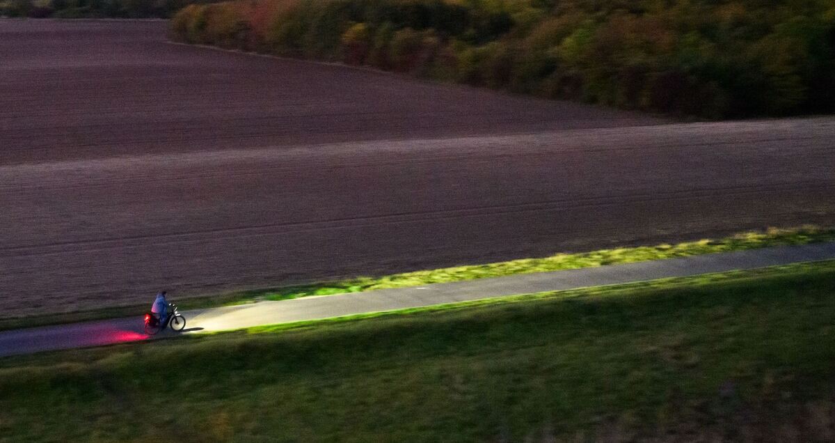 Fahrradfahrer am Morgen Fahrradfahrer am Morgen