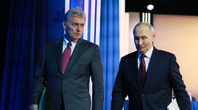 Putin und sein Pressesprecher Peskow