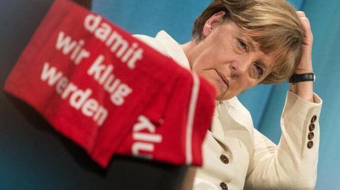 Angela Merkel und das Motto des Kirchentags: »Damit wir klug werden«. Foto: Marijan Murat