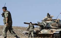 Türkische Bodentruppen sichern einen Grenzübergang nach Syrien. Foto: Sedat Suna/Archiv