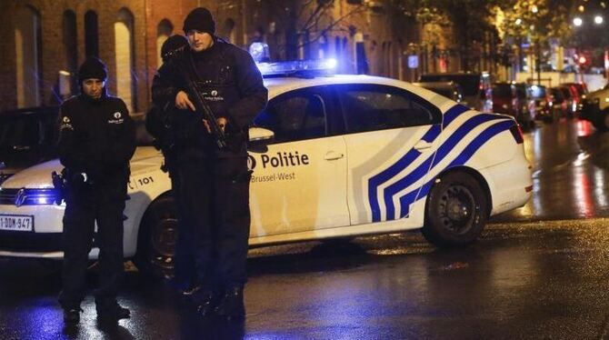Polizeieinsatz gegen Verdächtige im Brüsseler Stadtteil Molenbeek. Foto: Olivier Hoslet